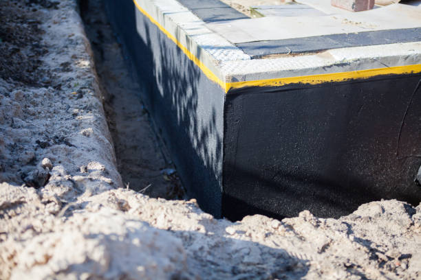 Professional Waterproofing technician working in Oxford, AL